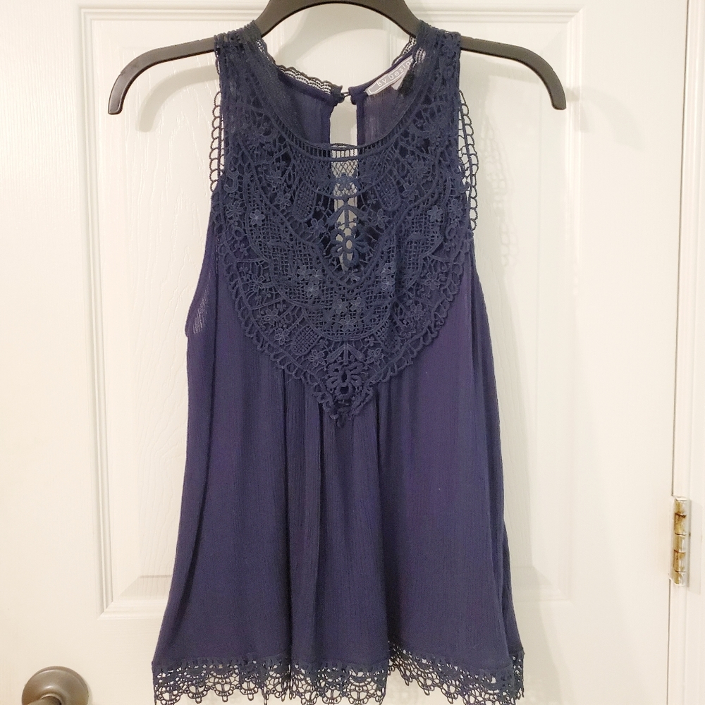3/25...By design. Lacy top
